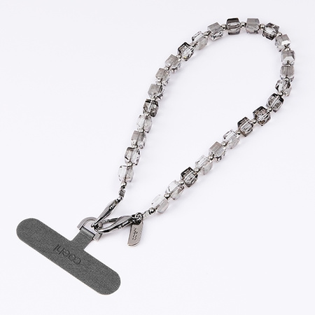 UNIQ Coehl Candy Gem Handstrap           uniwersalny sznurek do telefonu na rękę srebrny/silver sparkling