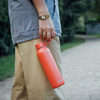 Quokka Solid With Strap - Butelka termiczna ze stali nierdzewnej 630 ml z paskiem (Orange)